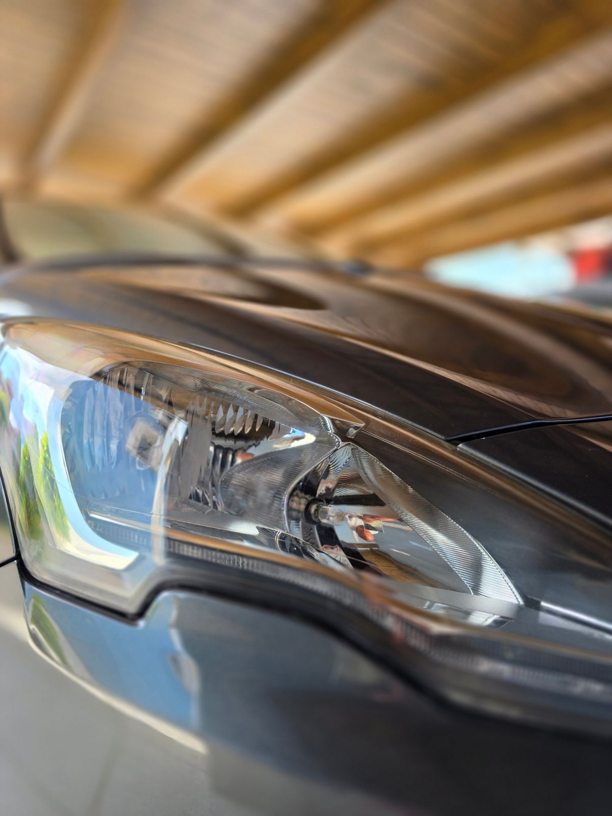 The same headlight restored to clear