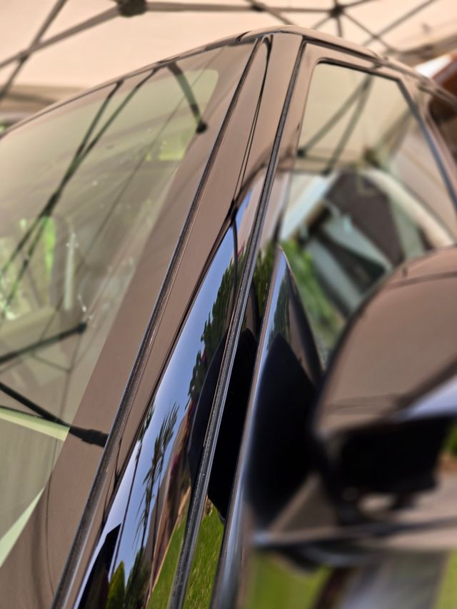 The same door pillar after correction, with deep reflections